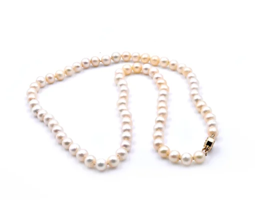 Ivory Semi Round Pearl Strand Necklace with 14 Karat Yellow Gold Clasp