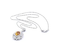 14 Karat White Gold Orange Sapphire and Diamond Necklace