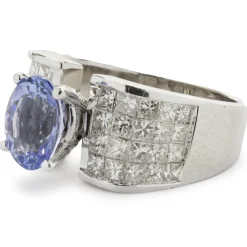 14 Karat White Gold Tanzanite and Invisible Set Diamond Ring