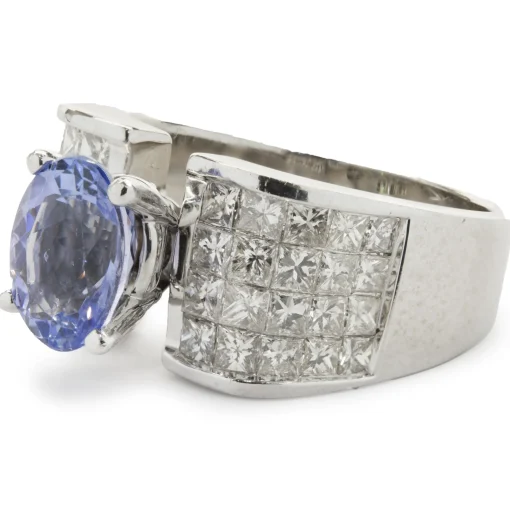 14 Karat White Gold Tanzanite and Invisible Set Diamond Ring