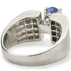 14 Karat White Gold Tanzanite and Invisible Set Diamond Ring