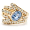 14 Karat Yellow Gold Bezel Set Cornflower Blue Sapphire and Diamond Bypass Ring