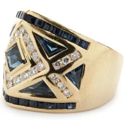 18 Karat Yellow Gold Channel Set Sapphire and Diamond Ring