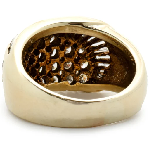 14 Karat Yellow Gold Round and Baguette Cut Diamond Swirl Ring